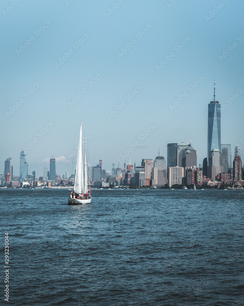 Sailing boat is heading to the Manhattan - New york