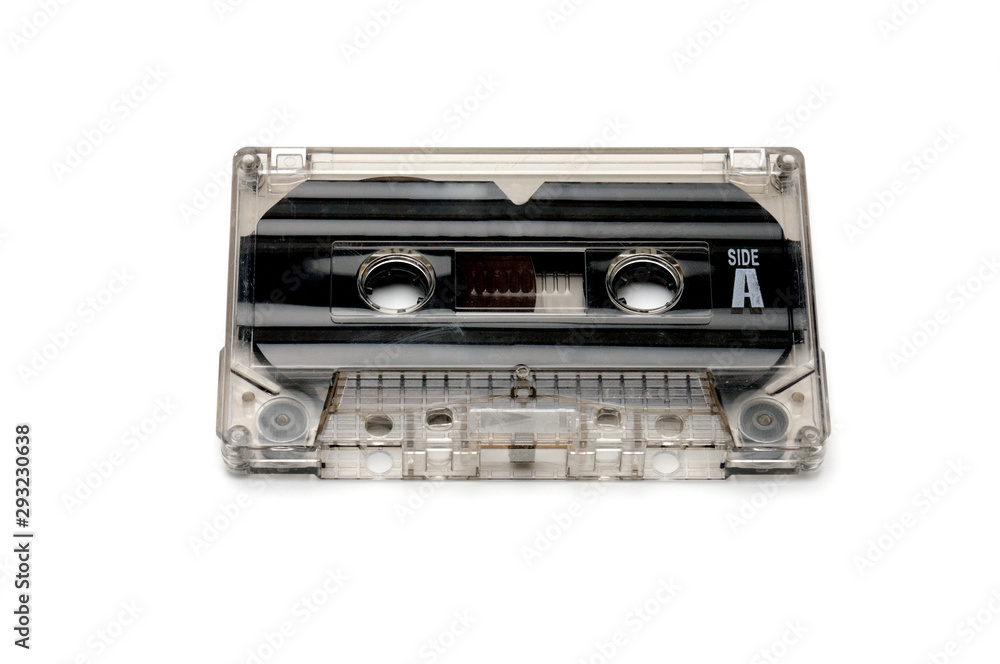 Compact audio tapes for magnetic recording on a white background.Compact cassette Compact audio tapes for magnetic recording on a white background.Compact cassette