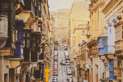 Old Narrow Street With Traditional Closed Wooden Balconies In Valletta city, Malta © nonglak