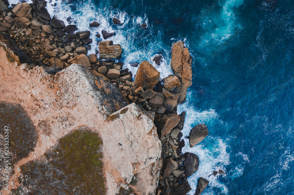 Bird eye view Atlantic ocean Portugal Peniche rocks and cliffs blue sea Bird eye view Atlantic ocean Portugal Peniche rocks and cliffs blue sea