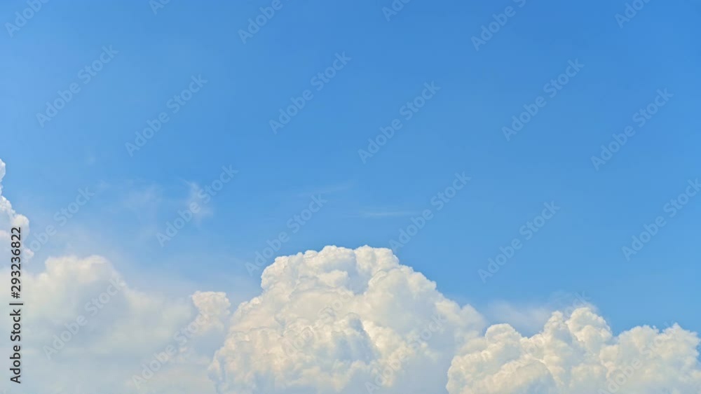 4K resolution Time lapse view of white cloud moving over blue sky background.  Time lapse clouds, rolling puffy cloud are moving, white lightness clouds time lapse.