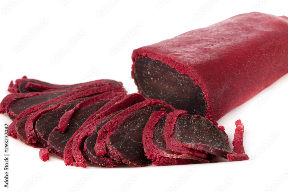 Fototapeta premium Jerky on a white background. Close-up of basturma sliced into pieces.
