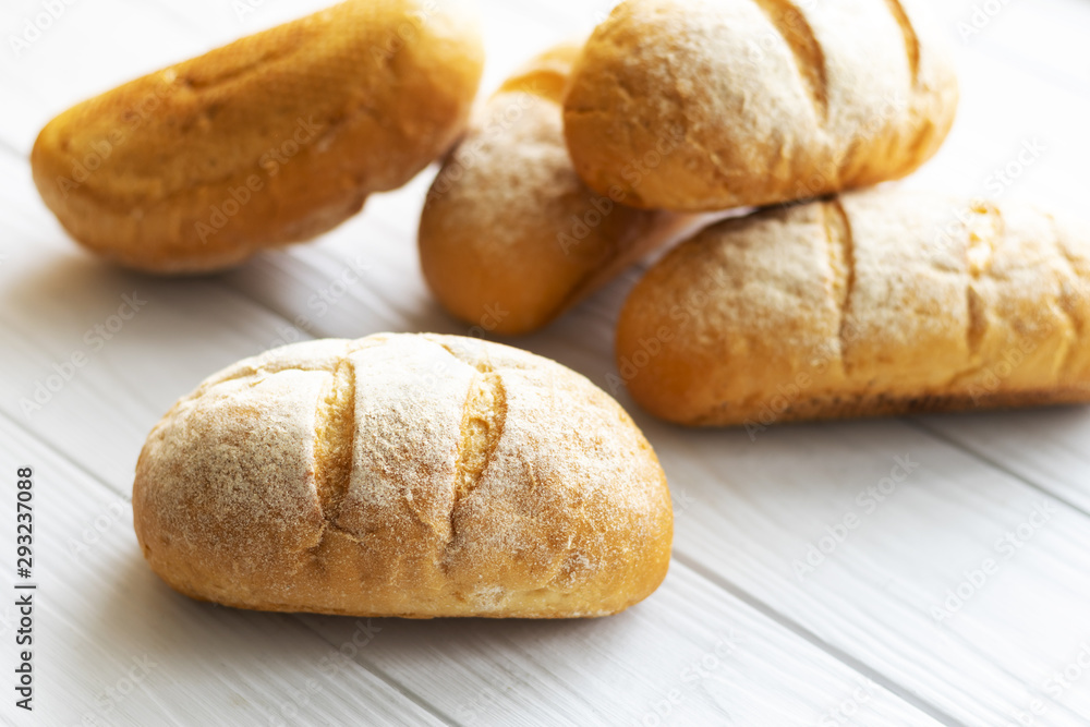 fresh homemade buns on a wooden table