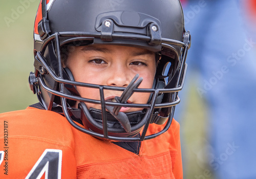 Closeup of young football player in uniform