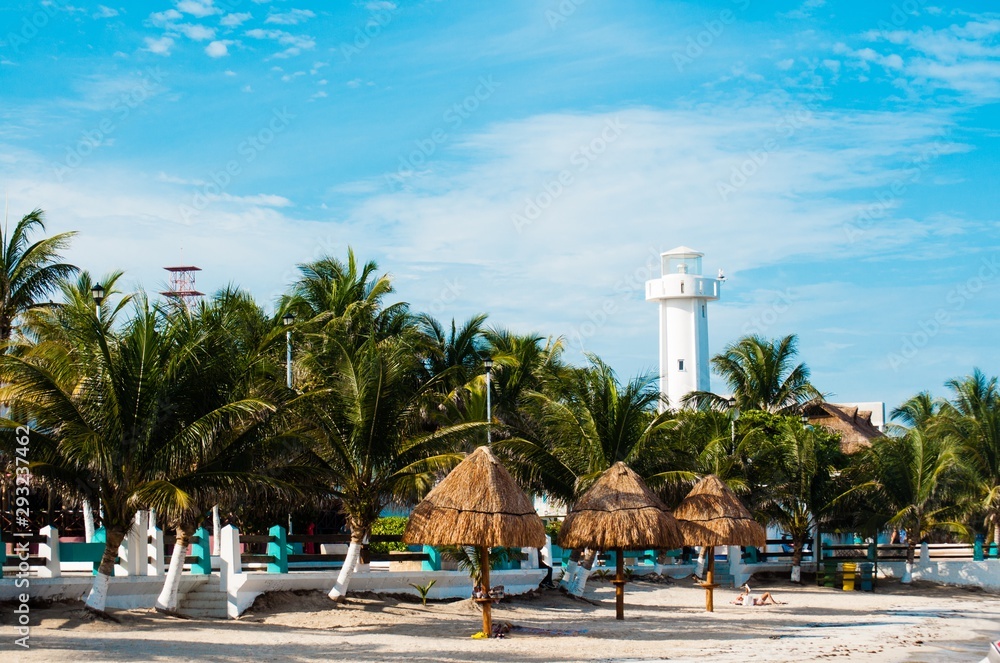 Lighthouse on the beach in Puerto Morelos, Mexico.