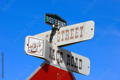 Cross streets signpost for OK Street and Naco Road in downtown historic Bisbee AZ