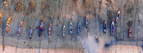 Fotografie, Obraz Aerial view of fishing boats at low tide