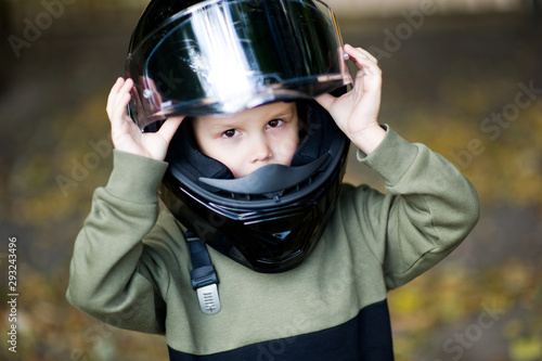 the boy in the helmet is looking seriously at the camera © Вячеслав Думчев