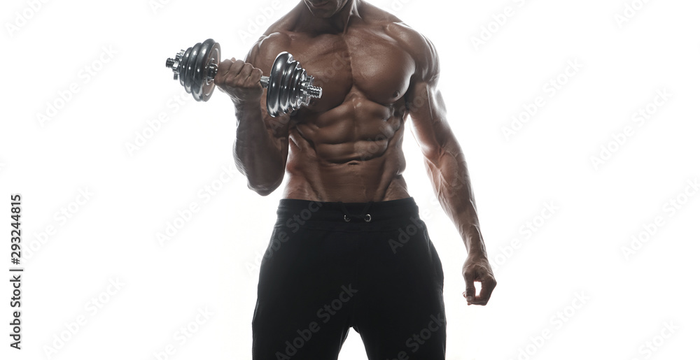 Fitness model man posing in studio