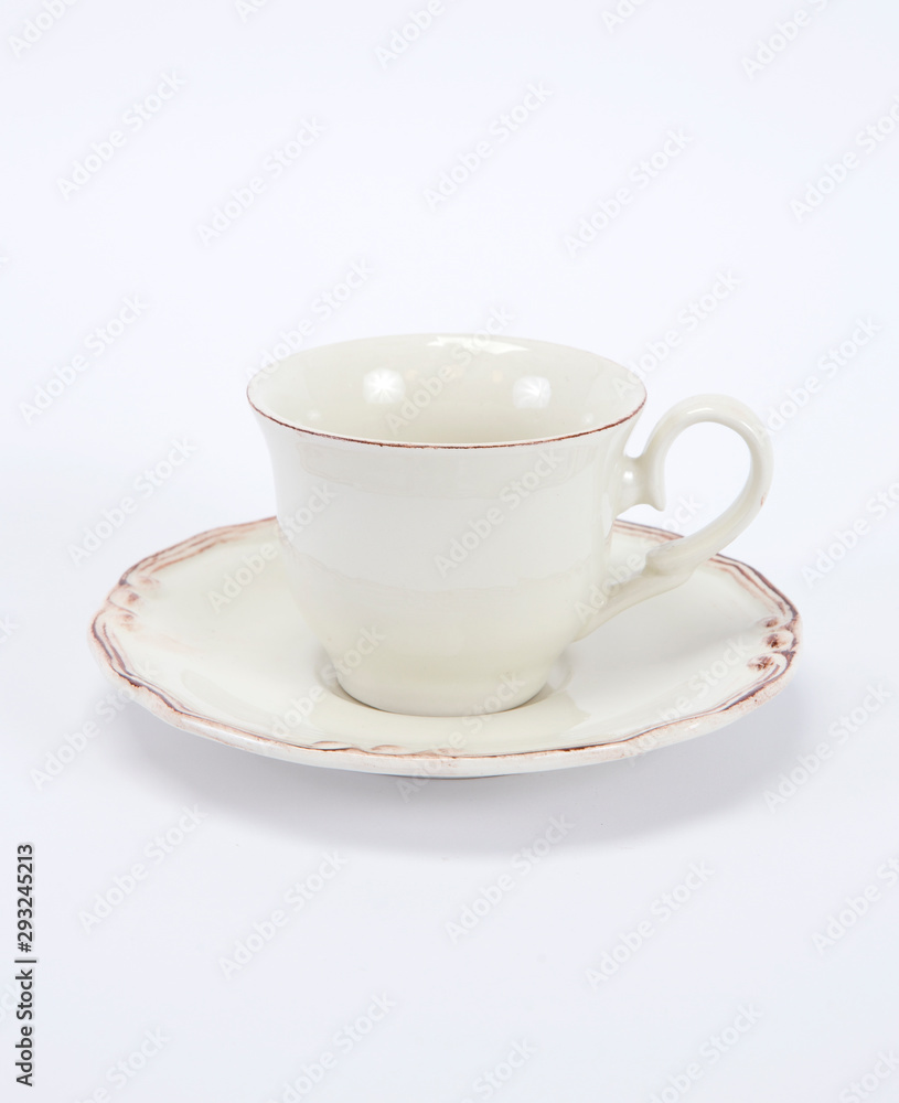 Empty white ceramic coffee or tea cup and saucer isolated on white background_2 Empty white ceramic coffee or tea cup and saucer isolated on white background_2