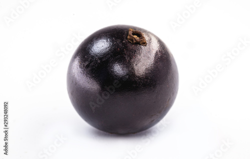 The jabuticaba or jabuticaba is a purplish black-white fruit, typical fruit of Brazil, on isolated white background. Rare organic and healthy fruits in South America, also known as Brazilian grapes.