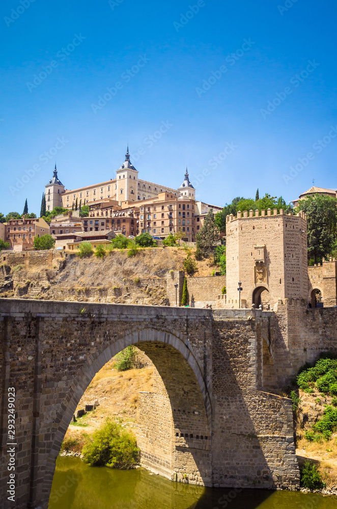 Panoramic view of  Alcazar and Alcantara Bridge in the city Toledo, Spain.