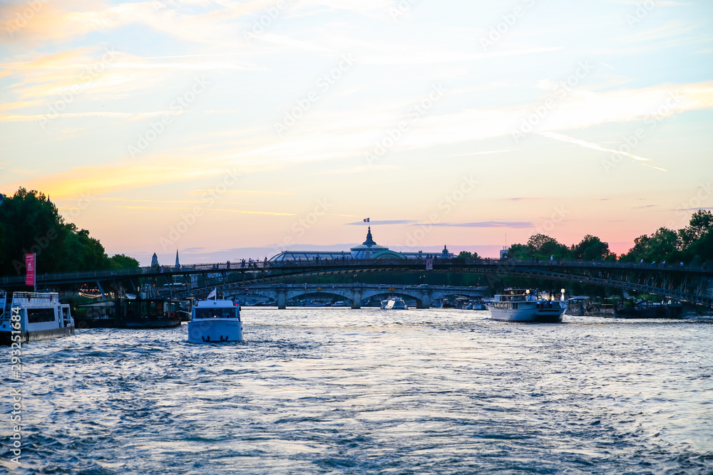 Fototapeta premium Views down the Seine River at dusk