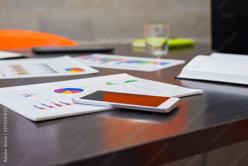 Financial reports and charts on a office table Financial reports and charts on a office table