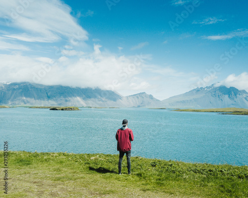The guy is enjoying the view on the endless mountains on Iceland © Branislav