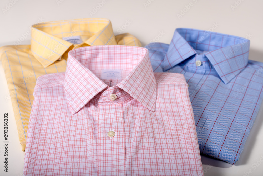 Men shirts folded and pressed. Business wear. Men dress shirts. Men Cloth. Men shirts folded and pressed. Business wear. Men dress shirts. Men Cloth.
