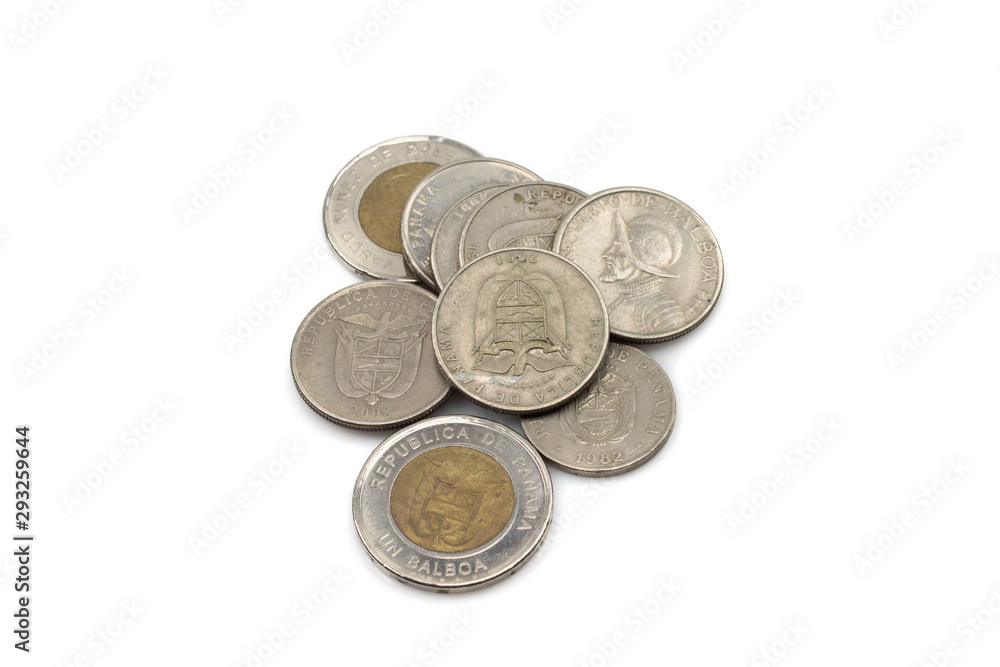 An assortment of silver and bimettalic coins, close up in macro from Panama on a white, clean background An assortment of silver and bimettalic coins, close up in macro from Panama on a white, clean background