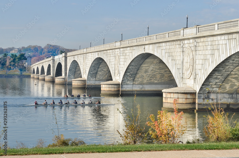 Memorial Bridge in autumn foliage and kayak riders n Potomac River - Washington D.C. United States of America