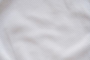 White fabric sport clothing football jersey with air mesh texture background