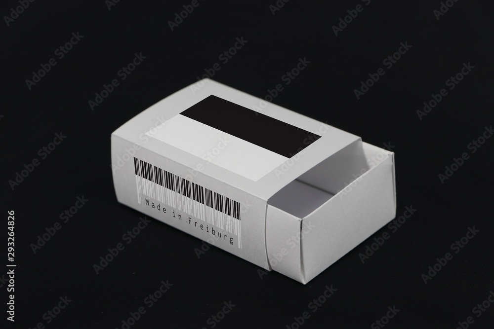Freiburg flag on white box with barcode and the canton color flag of Switzerland on black background, paper packaging for put match or products. Freiburg flag on white box with barcode and the canton color flag of Switzerland on black background, paper packaging for put match or products.