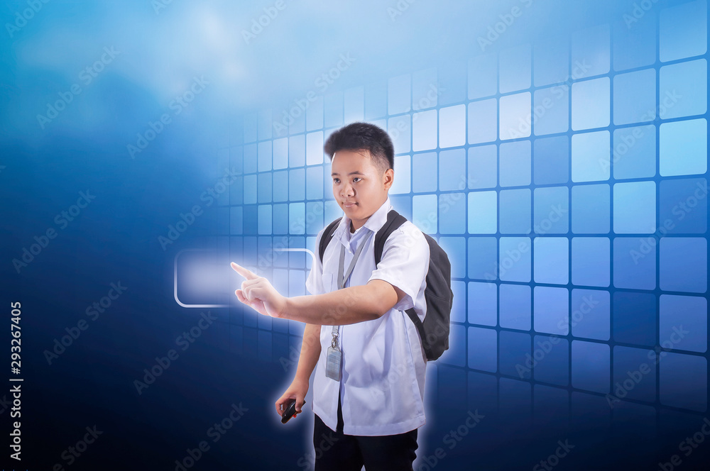 Teenage boy student in school uniform with backpack using holographic screen in advance technology concept Teenage boy student in school uniform with backpack using holographic screen in advance technology concept