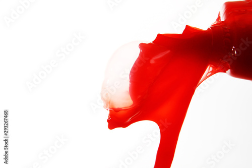 Red sauce on white background photo