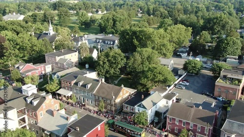 Aerial truck shot of floats in historic restored residential district, Lititz Lancaster County, Pennsylvania 4th of July celebration parade photo