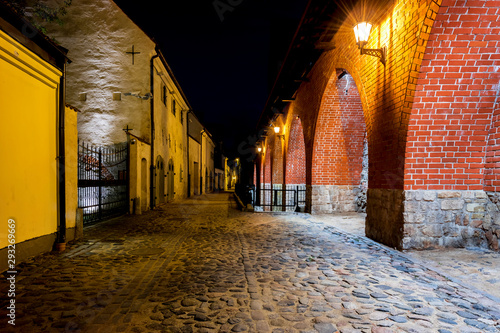 Medieval street at night, old European town