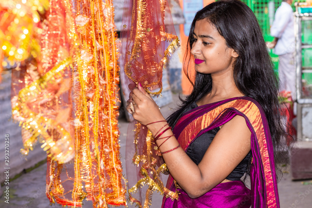 Φωτογραφία Beautiful Indian woman shopping decorative products for Diwali and festive seaso