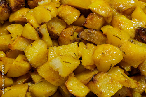 Buffet meals in the all-inclusive restaurant. Hotel food. Potato with curry spices.