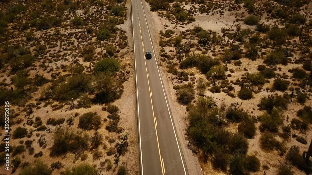Drone shot following car on highway Drone shot following car on highway