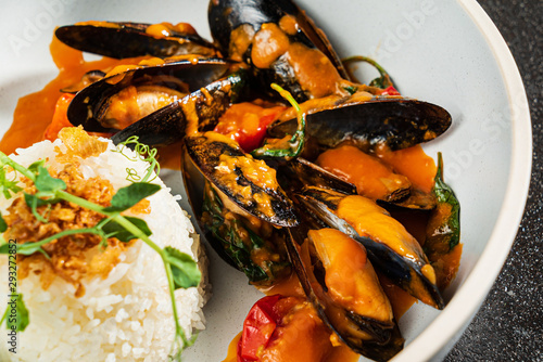 Cooked Mussels  with rice and sauce