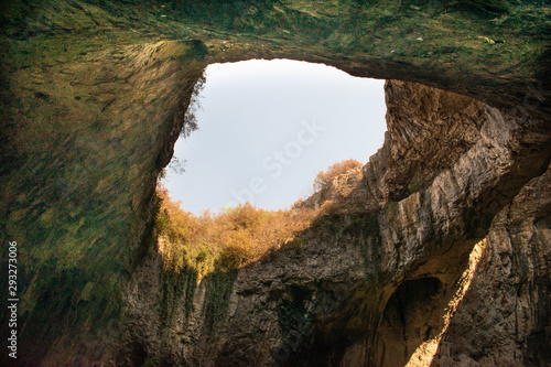 View inside the Devetashka Cave near Devetaki village and Osam river in Lovech, Bulgaria. Natural wonder. One of the largest karst cave in Eastern Europe, now home to near 30000 bats