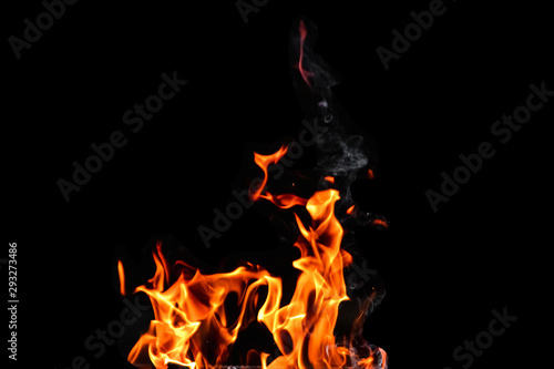 Fire, flames on a black background isolate. Concept fire grill heat weekend barbecue. © Aliaksandr Marko