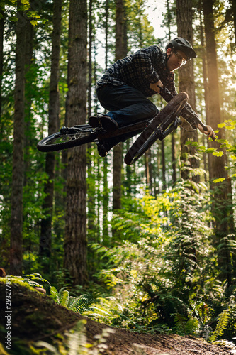 Amazing Mountain Bike Jump Trick in Forest with Golden Hour Lighting