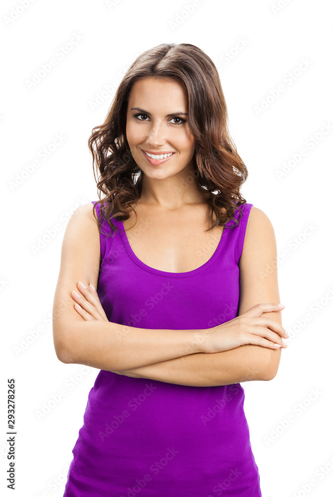 Portrait of young smiling beautiful brunette woman in casual smart lilac clothing with crossed arms, isolated against white background Portrait of young smiling beautiful brunette woman in casual smart lilac clothing with crossed arms, isolated against white background