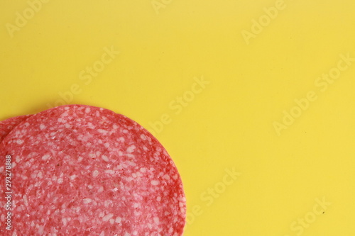 slices of salami in colorful background