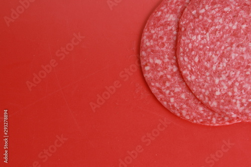 slices of salami in colorful background