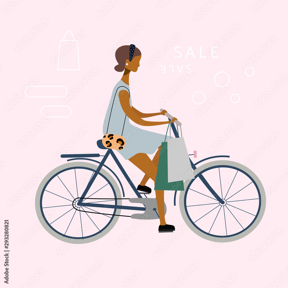 Bicycle stylish woman or girl is riding from shops. Trendy byer