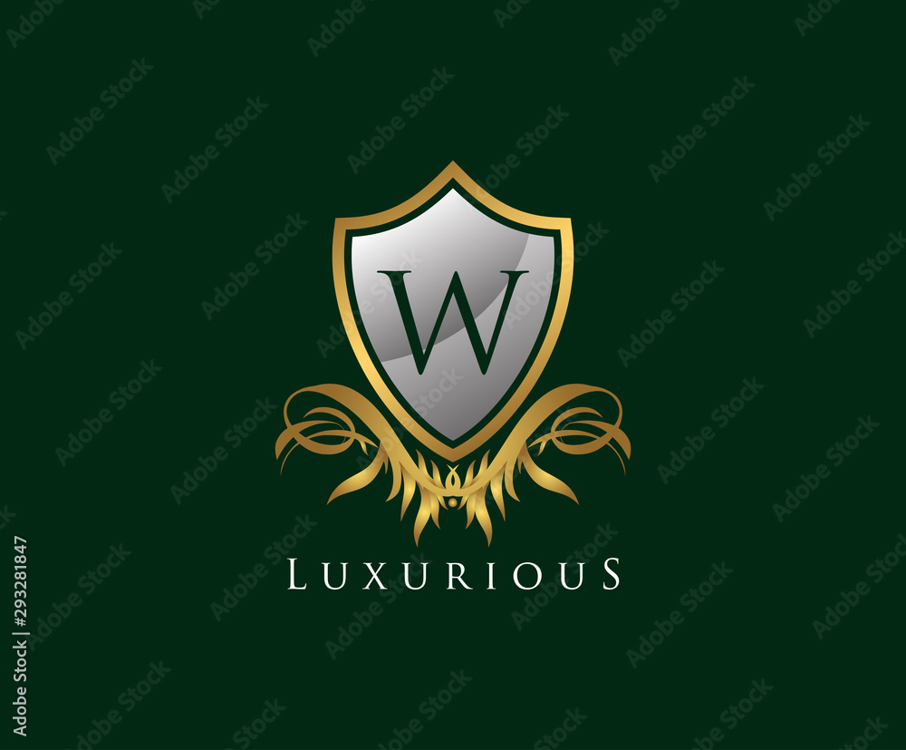 Obraz premium Classy Shield W Letter Logo. Gold Vintage Shield With W Letter prefect for boutique, hotel, restaurant, wedding and other elegant business.