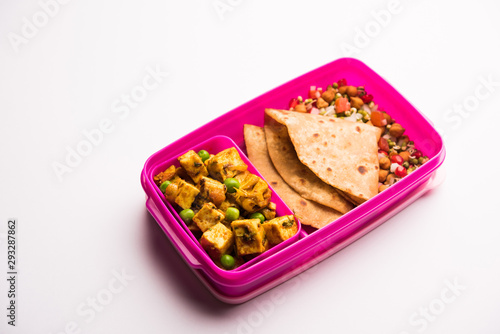 Lunch Box / Tiffin for Indian kids, hot Hot Paneer sabzi with roti / chapati, accompanied with sprouts photo