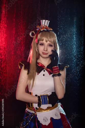 Cosplay of school idol / young cute beautiful girl anime cartoon singing with rain background