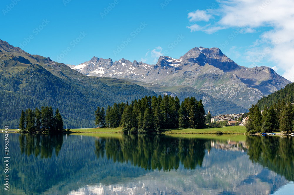 The small village of Silvaplana with the lake (Silvaplanersee) in Swiss Alps near Saint Moritz. Engadin valley, Graubunden canton, Maloja region, Switzerland, Europe