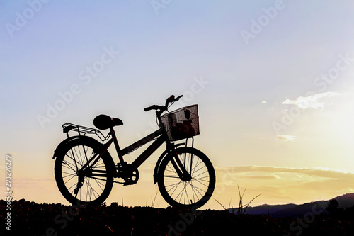 bike on the mountain sunset background