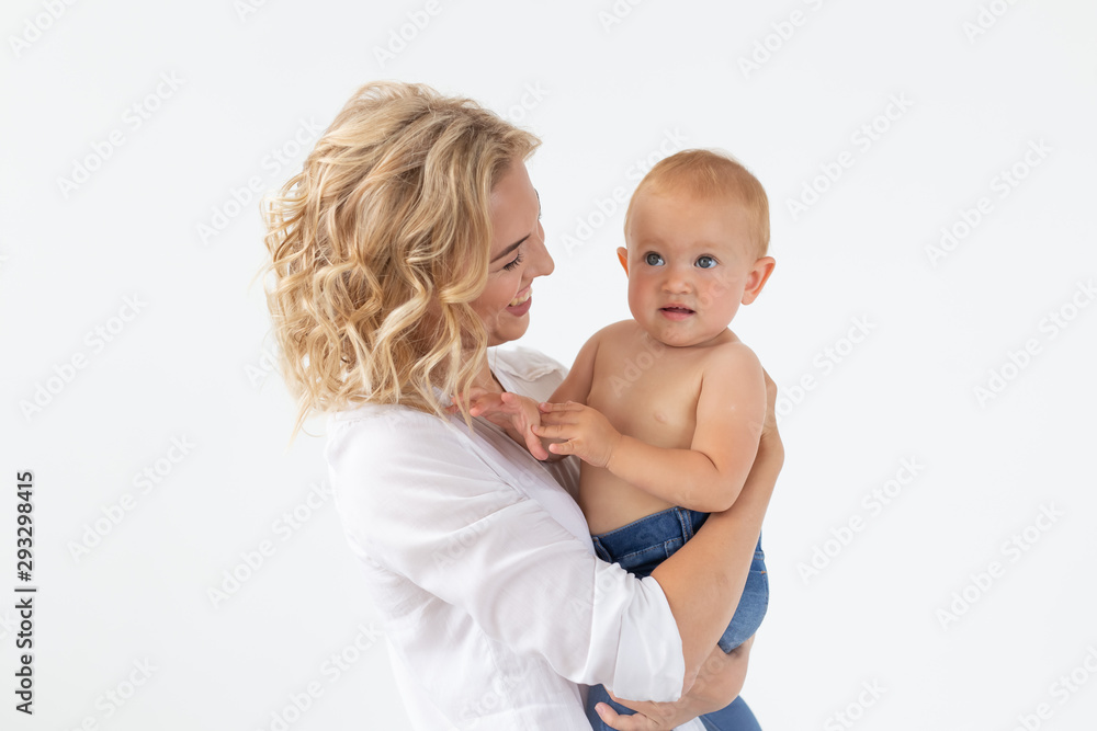 Happy mother with adorable baby on white background Happy mother with adorable baby on white background