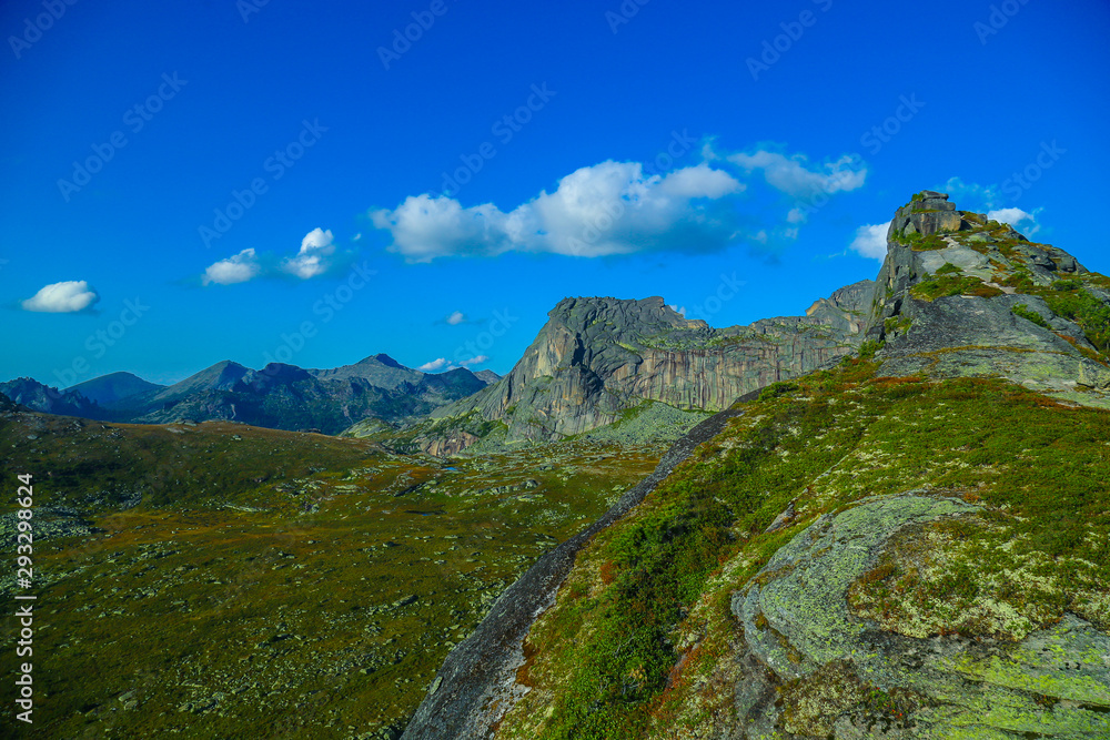 mountain view with rocks and blue sky