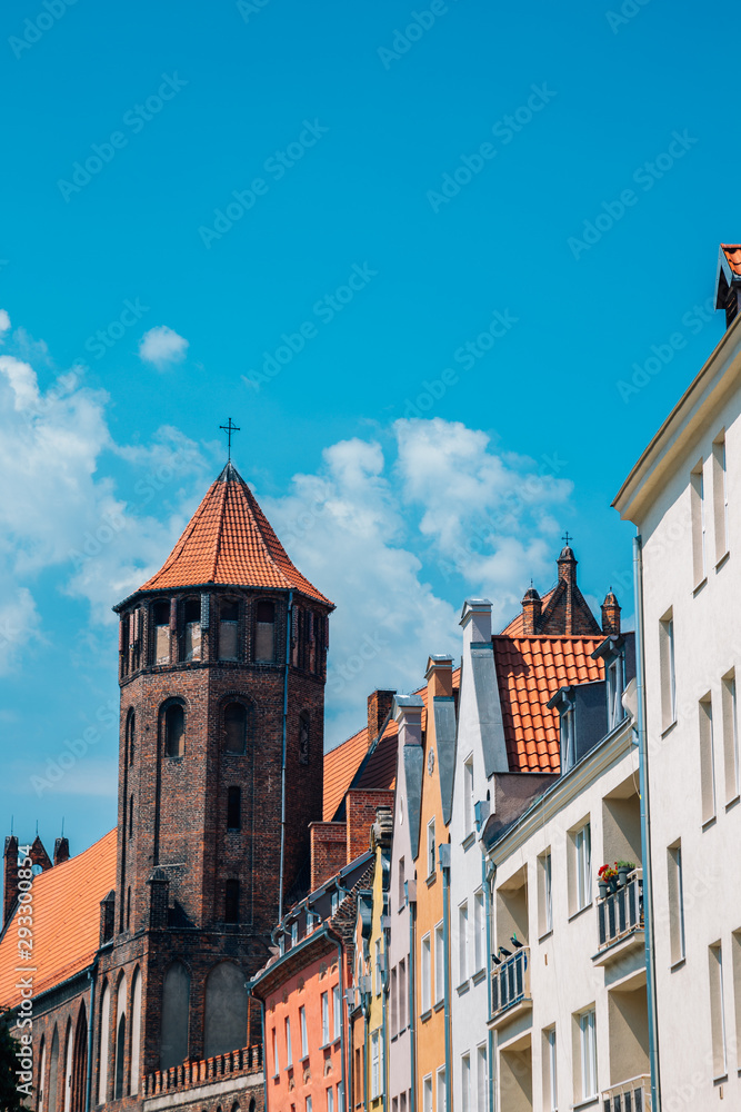 St. Nicholas Roman Catholic Church and old town buildings in Gdansk, Poland