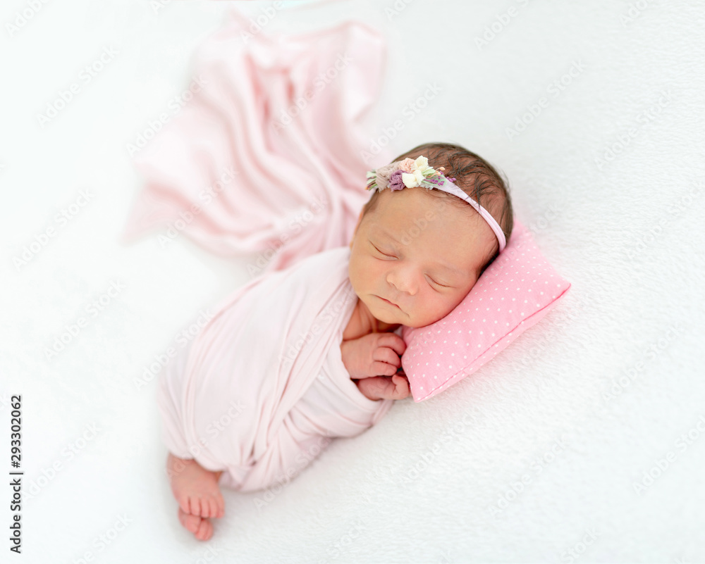 newborn baby sleeping on a little pillow newborn baby sleeping on a little pillow