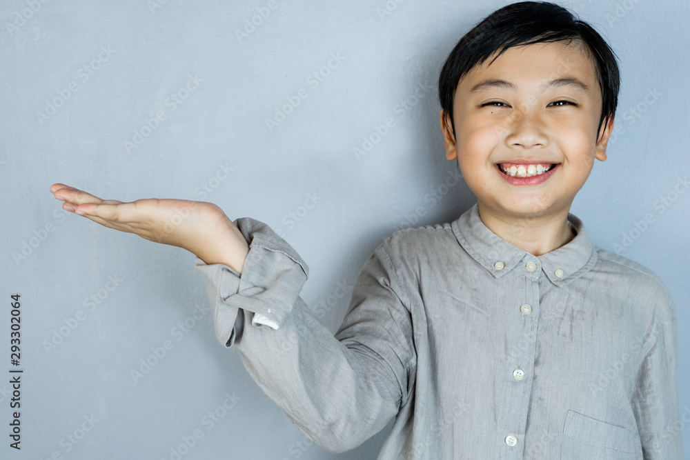Little boy showing his hand and copy space Little boy showing his hand and copy space