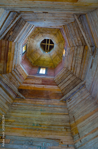 Dome of a wooden orthodox church. Inside view